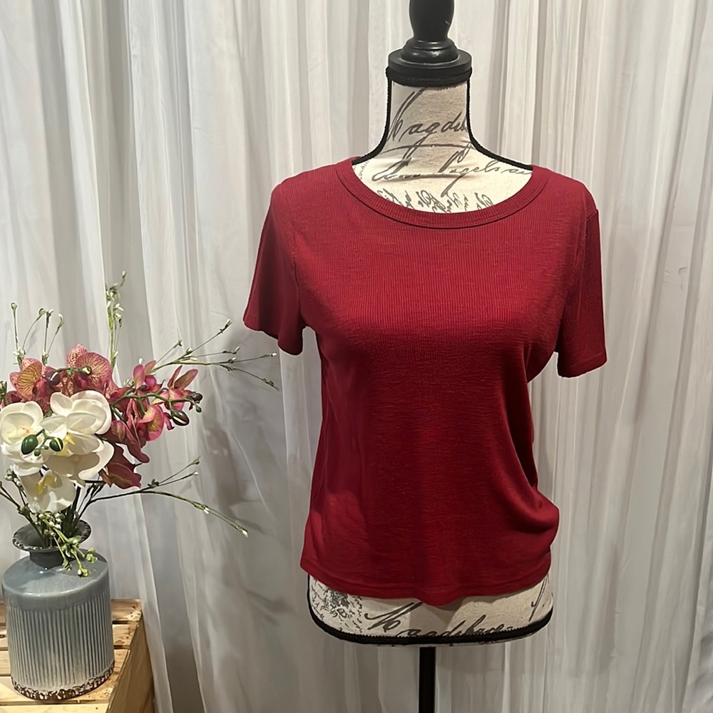 The brand is SO, it red and is in size medium.